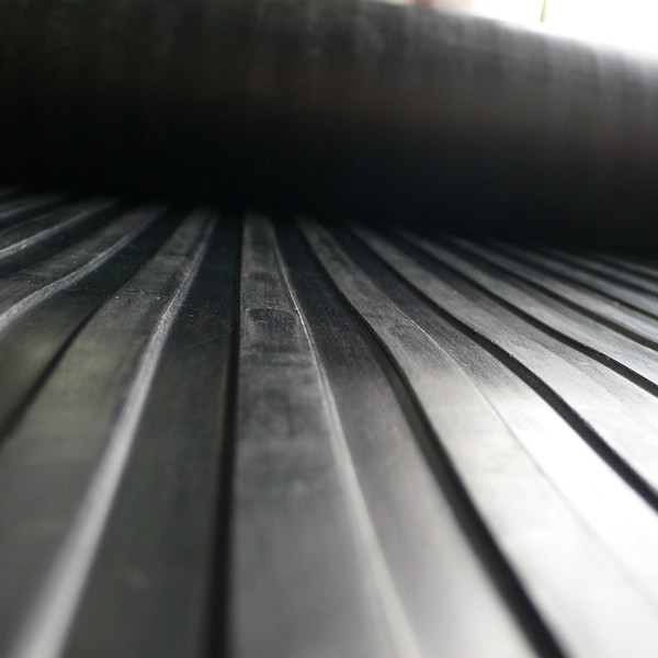 Rubber-Cal "Wide-Rib" Corrugated Rubber Floor Mat - 1/8 in x 3 ft x 20 ft - Black Rubber Roll - 03-167-WR-P