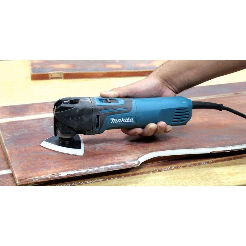 Juego de herramientas múltiples oscilante con cable de 3 amperios y velocidad variable de Makita, con hoja, base para lijar, papel de lija, adaptador, estuche duro - TM3010CX1.