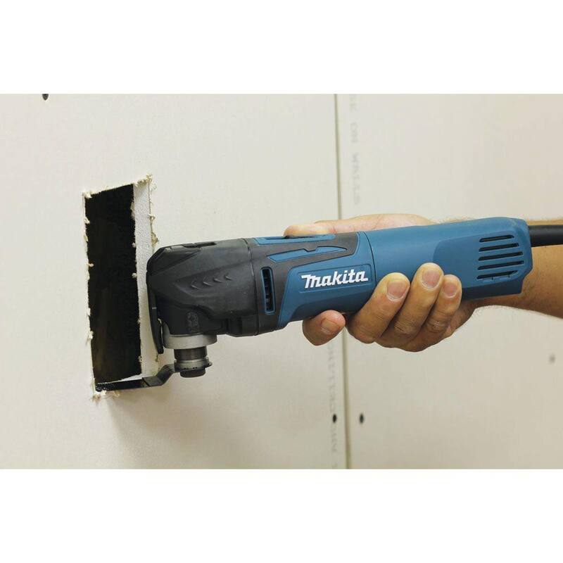 Juego de herramientas múltiples oscilante con cable de 3 amperios y velocidad variable de Makita, con hoja, base para lijar, papel de lija, adaptador, estuche duro - TM3010CX1.