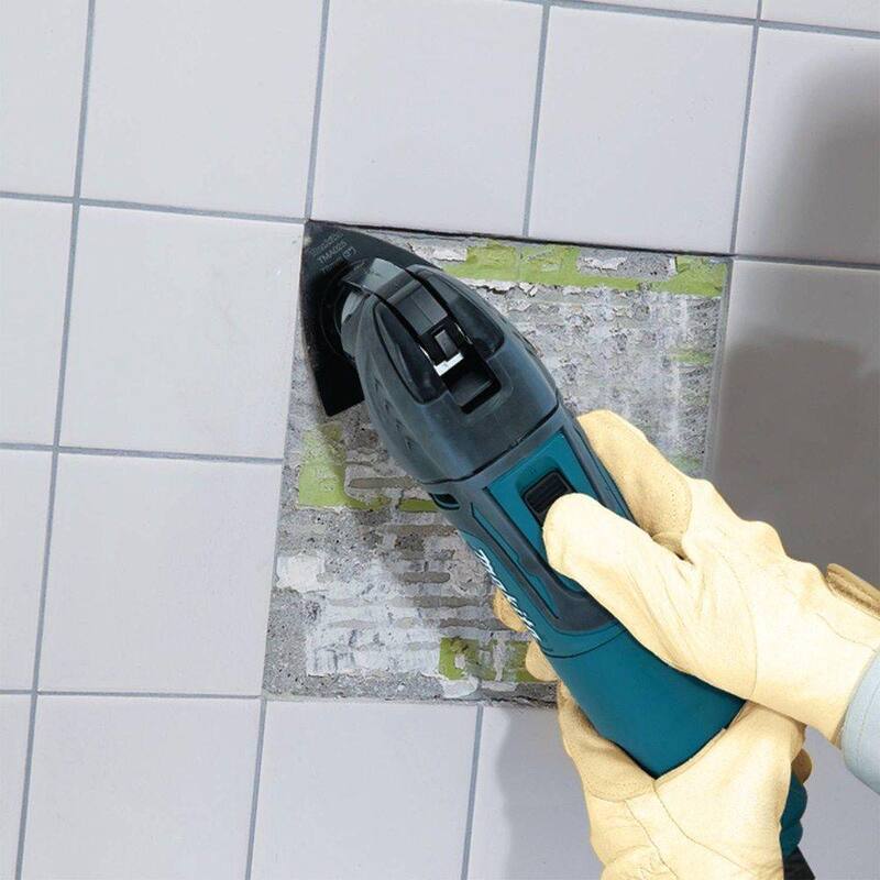 Juego de herramientas múltiples oscilante con cable de 3 amperios y velocidad variable de Makita, con hoja, base para lijar, papel de lija, adaptador, estuche duro - TM3010CX1.