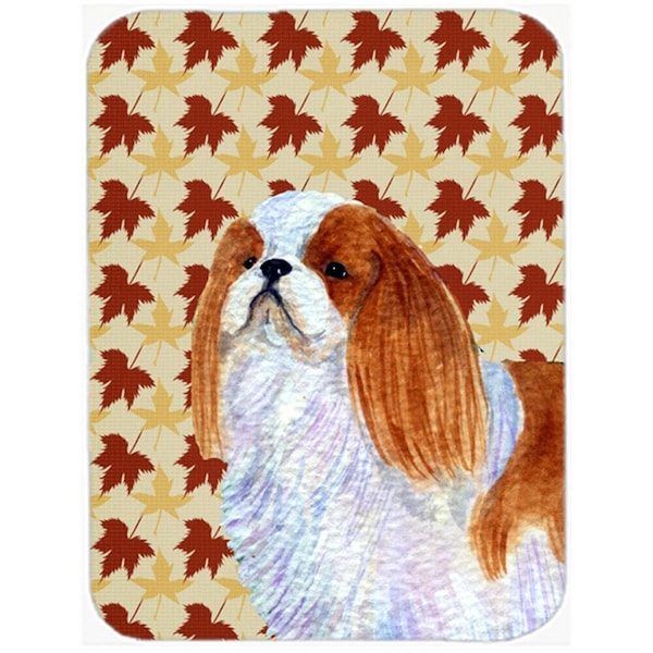 Carolines Treasures 12 x 15 in. English Toy Spaniel Fall Leaves Portrait Glass Cutting Board- Large - SS4349LCB