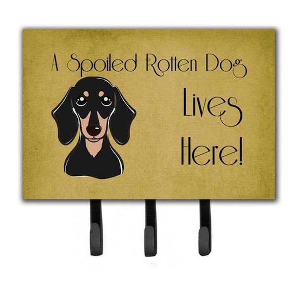 Carolines Treasures Carolines Treasures BB1463TH68 Smooth Black And Tan Dachshund Spoiled Dog Lives Here Leash & Key Holder - BB1463TH68
