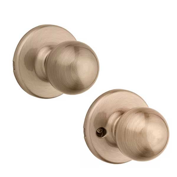 Kwikset Kwikset: Polo Passage Door Knob with Round Rose / Antique Brass - KWS-200P-RDT-5