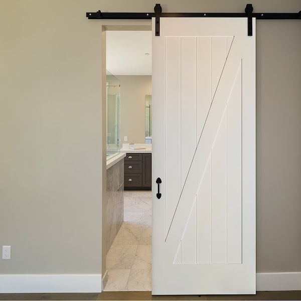 Codel Doors 36" x 84 " Primed 1-Panel Z-Bar Barn Slab Door - 3070PRI8401Z