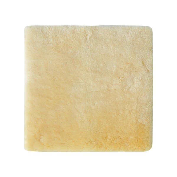Homeroots 17 in. Square Natural Off White Medical Grade Sheepskin Chair Pad - 388651
