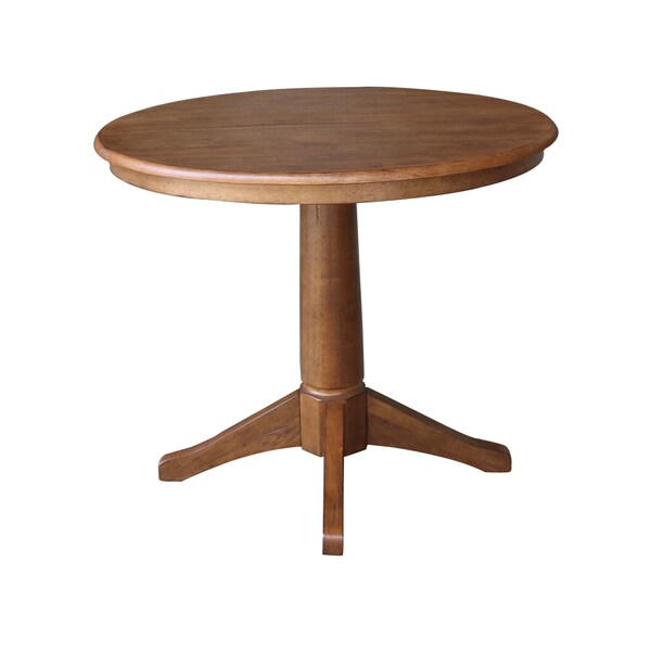 International Concepts Round 36 in Round Top Pedestal Table with 12 in Leaf, 30.1 in H, Distressed Oak, 36 in W, 48 in L - K42-36RXT-27B