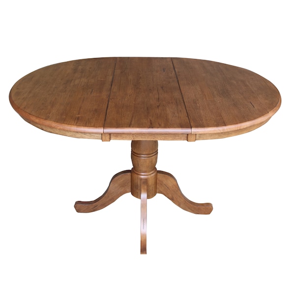 International Concepts Round 36 in Round Top Pedestal Table with 12 in Leaf, 29.3 in H, Distressed Oak, 36 in W, 48 in L - K42-36RXT