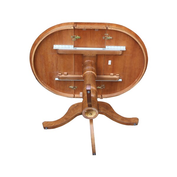 International Concepts Round 36 in Round Top Pedestal Table with 12 in Leaf, 35.3 in H, Distressed Oak, 36 in W, 48 in L - K42-36RXT-6B