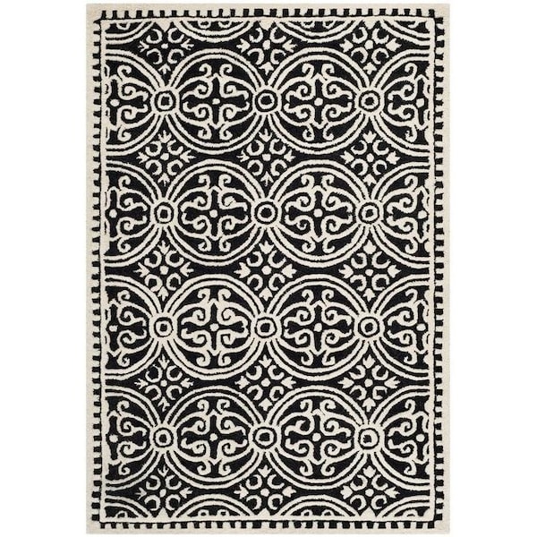 Safavieh 2 ft.-6 in. x 12 ft. Cambridge Hand Tufted Runner RugBlack & Ivory - CAM123E-212