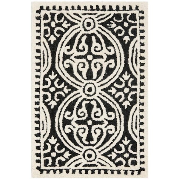 Safavieh 2 ft.-6 in. x 12 ft. Cambridge Hand Tufted Runner RugBlack & Ivory - CAM123E-212