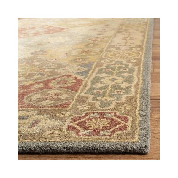 Safavieh 4 ft.-6 in. x 6 ft.-6 in. Oval Traditional Antiquity- Multi and Beige Hand Tufted Rug - AT316A-5OV