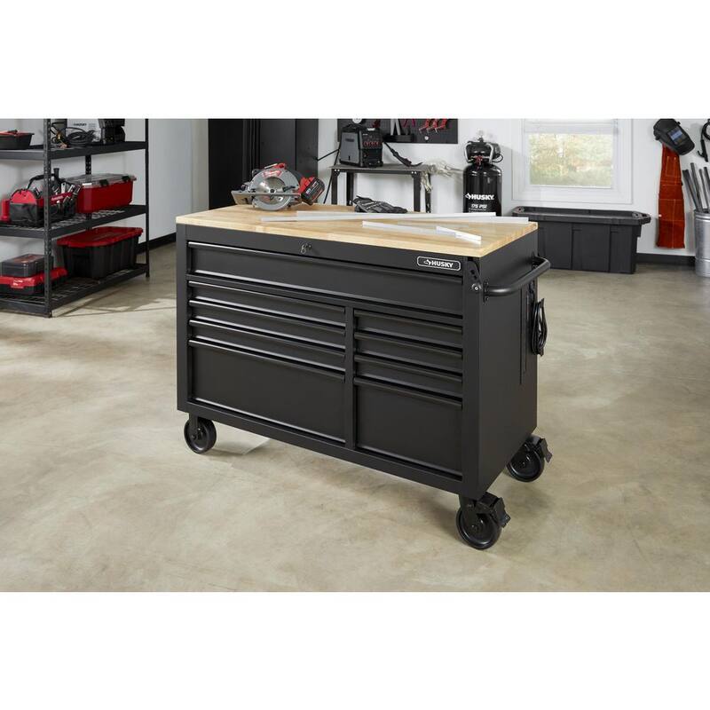 Banco de trabajo móvil de 9 cajones pesado Husky de 52 pulgadas de ancho x 25 pulgadas de profundidad con encimera de madera dura ajustable en altura en negro mate - HOLC5209BB1M