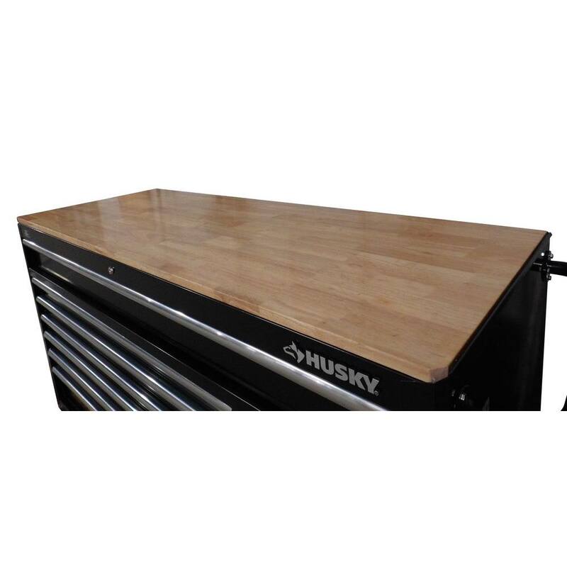 Banco de trabajo móvil con 12 cajones y parte superior de madera sólida en negro brillante de Husky 66 pulg. de ancho x 24 pulg. de profundidad - 76812A24