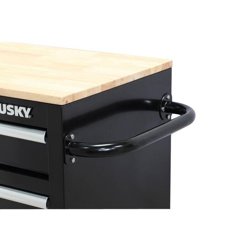 Banco de trabajo móvil con 12 cajones y parte superior de madera sólida en negro brillante de Husky 66 pulg. de ancho x 24 pulg. de profundidad - 76812A24