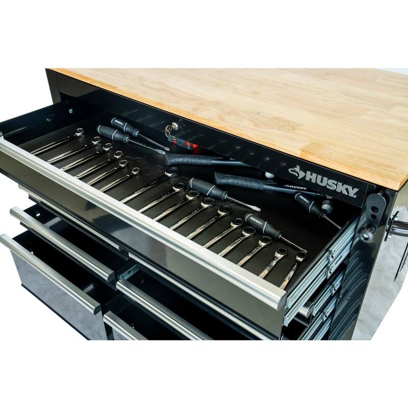 Banco de trabajo móvil Husky de 46 pulgadas x 25 pulgadas con 9 cajones y parte superior de madera ajustable en altura en color negro brillante - HOLC4609B11M
