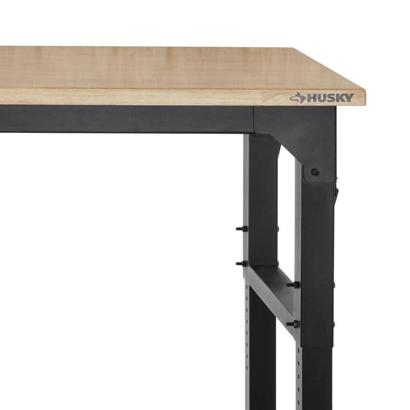Mesa de trabajo Husky de 6 pies con altura ajustable y encimera de madera sólida en color negro para sistema de almacenamiento de garaje de acero soldado resistente - HTC1000004.