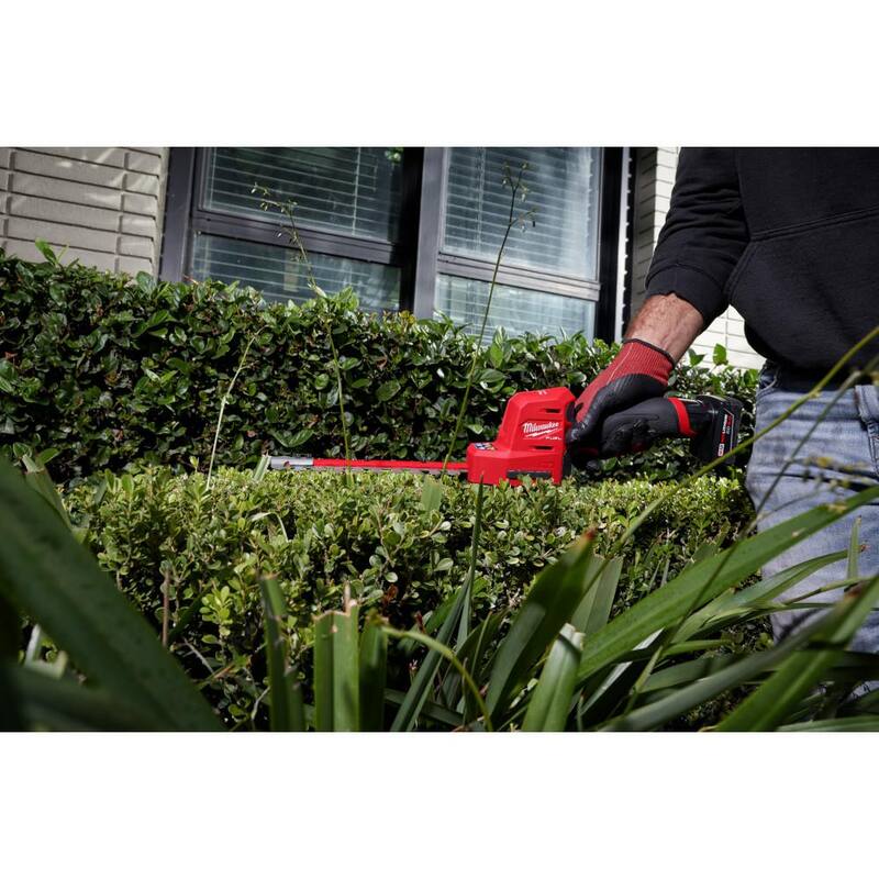 Milwaukee M12 FUEL 8 in. 12V Lithium-Ion Brushless Cordless Hedge Trimmer Kit with M18 FUEL 16 in. Chainsaw (2-Tool) - 2533-21-2727-20
