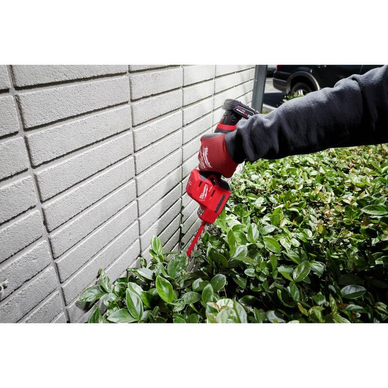 Milwaukee M12 FUEL 8 in. 12V Lithium-Ion Brushless Cordless Hedge Trimmer Kit with M18 FUEL 14 in. Chainsaw (2-Tool) - 2533-21-2727-20C