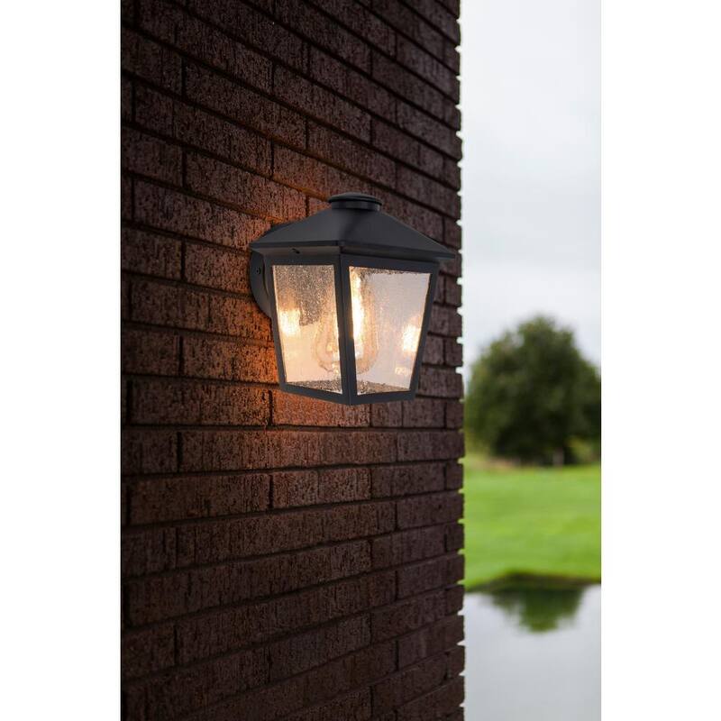 Luz de pared exterior con un candelero Hampton Bay Malena de 7.83 pulgadas y 1 luz en color negro con cableado duro y cristal claro con semillas - 5294503012