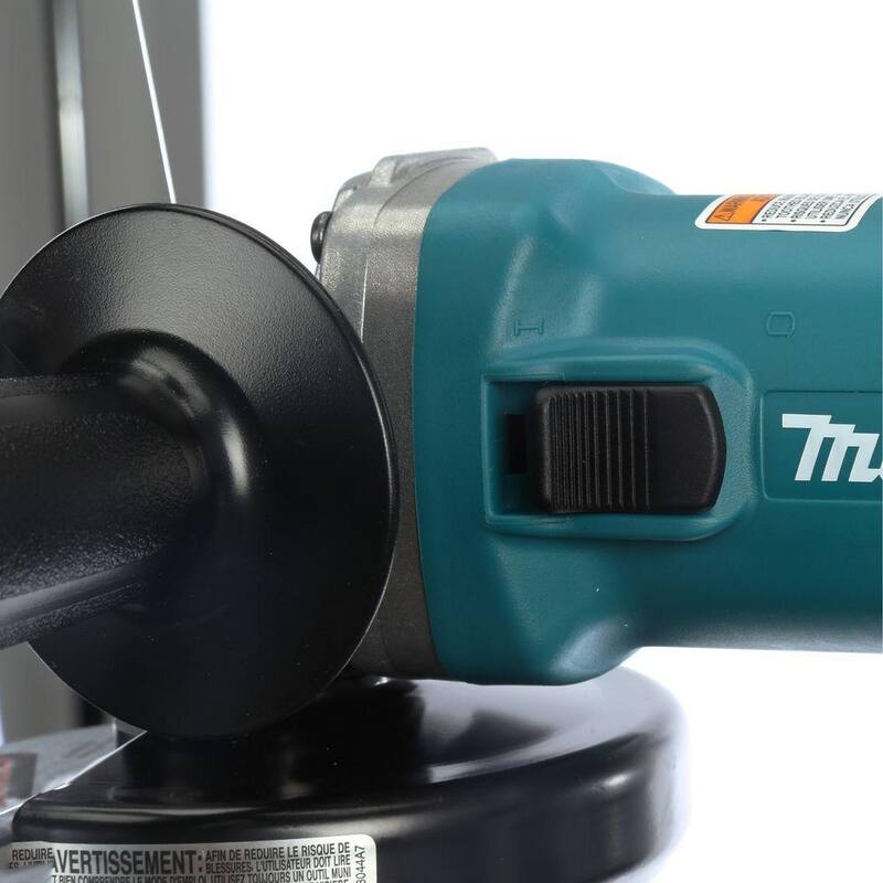 Makita 7.5 amperios con cable 4-1/2 pulgadas Amoladora angular compacta de cambio de llanta fácil con rueda de amolar, protector de rueda y mango lateral - 9557NB.