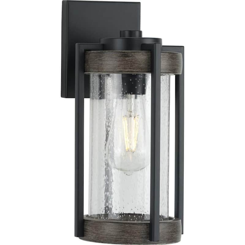 Luz de linterna de pared exterior estilo granja con un foco Progress Lighting Whitmire de 1 luz en negro mate con acentos de roble envejecido y cristal transparente con semillas - P560281-31M.