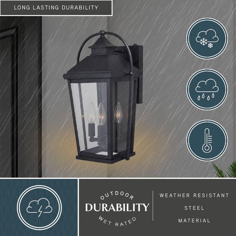 Lámpara de pared exterior VAXCEL Lexington de 3 luces con sensor de anochecer a amanecer, color negro, vidrio transparente - T0539