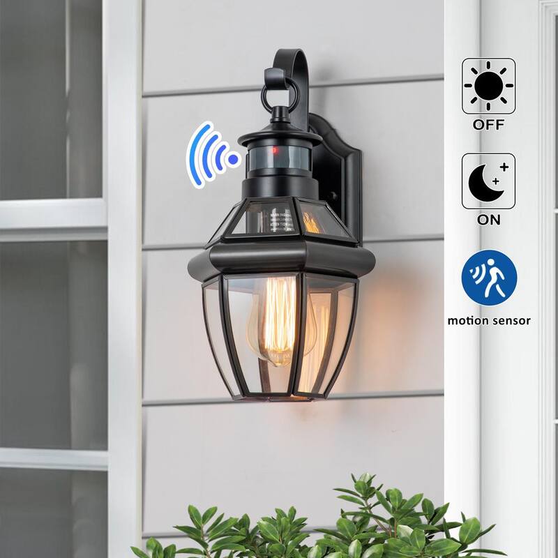 Lámpara de pared al aire libre C Cattleya de 1 luz con sensor de movimiento en acabado negro de metal y latón con cristal templado transparente al atardecer y amanecer - CA2211-W