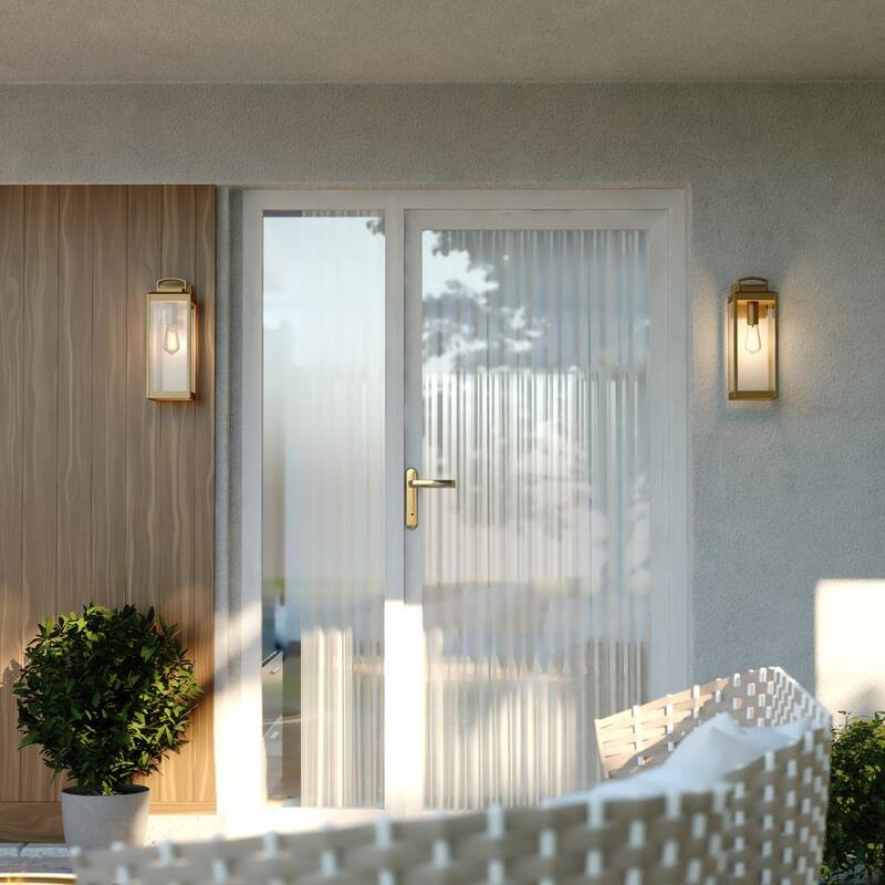 VAXCEL Kinzie 16.75 in. H 1-Light Dusk to Dawn Gold Vintage Brass Hardwired Outdoor Wall Lantern Fixture with Clear Glass - T0707 
Lámpara de pared exterior VAXCEL Kinzie de 16.75 pulgadas de alto con luz de un foco, atardecer a amanecer, estilo vintage de latón dorado, con cristal transparente - T0707