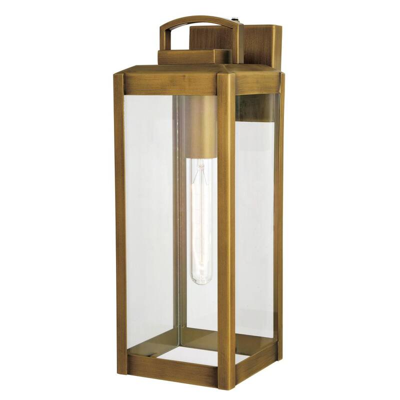 VAXCEL Kinzie 16.75 in. H 1-Light Dusk to Dawn Gold Vintage Brass Hardwired Outdoor Wall Lantern Fixture with Clear Glass - T0707 
Lámpara de pared exterior VAXCEL Kinzie de 16.75 pulgadas de alto con luz de un foco, atardecer a amanecer, estilo vintage de latón dorado, con cristal transparente - T0707