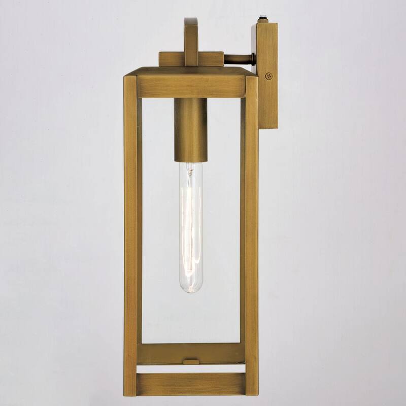 VAXCEL Kinzie 16.75 in. H 1-Light Dusk to Dawn Gold Vintage Brass Hardwired Outdoor Wall Lantern Fixture with Clear Glass - T0707 
Lámpara de pared exterior VAXCEL Kinzie de 16.75 pulgadas de alto con luz de un foco, atardecer a amanecer, estilo vintage de latón dorado, con cristal transparente - T0707