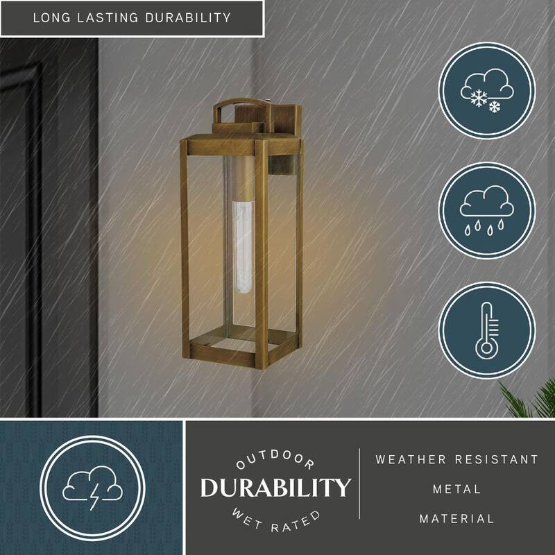 VAXCEL Kinzie 16.75 in. H 1-Light Dusk to Dawn Gold Vintage Brass Hardwired Outdoor Wall Lantern Fixture with Clear Glass - T0707 
Lámpara de pared exterior VAXCEL Kinzie de 16.75 pulgadas de alto con luz de un foco, atardecer a amanecer, estilo vintage de latón dorado, con cristal transparente - T0707
