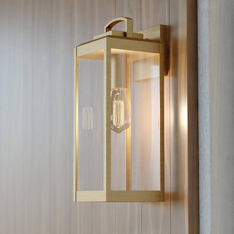 VAXCEL Kinzie 16.75 in. H 1-Light Dusk to Dawn Gold Vintage Brass Hardwired Outdoor Wall Lantern Fixture with Clear Glass - T0707 
Lámpara de pared exterior VAXCEL Kinzie de 16.75 pulgadas de alto con luz de un foco, atardecer a amanecer, estilo vintage de latón dorado, con cristal transparente - T0707