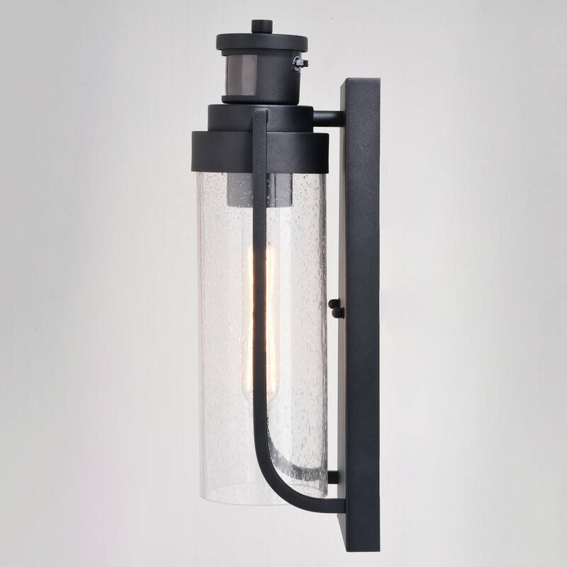 Lámpara de pared exterior VAXCEL Lawton Steel LED Compatible Black con Sensor de Movimiento al Anochecer y al Amanecer de Cristal Transparente Transicional - T0749
