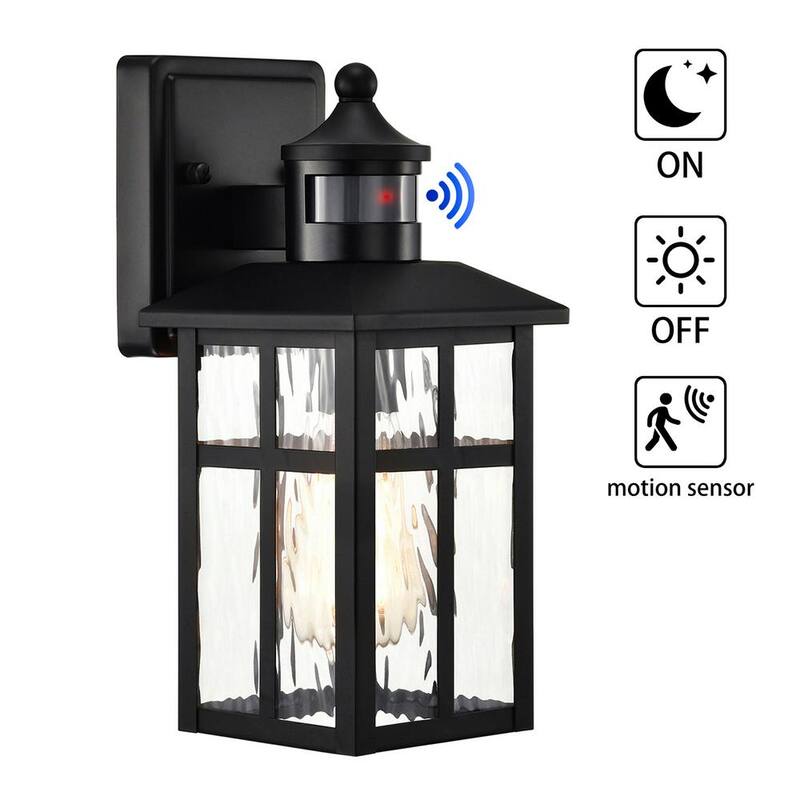 Edvivi 12 pulg. Aplique de pared exterior con sensor de movimiento de 1 luz en negro mate con luz de atardecer a amanecer y vidrio ondulado de agua - EW671S-BK