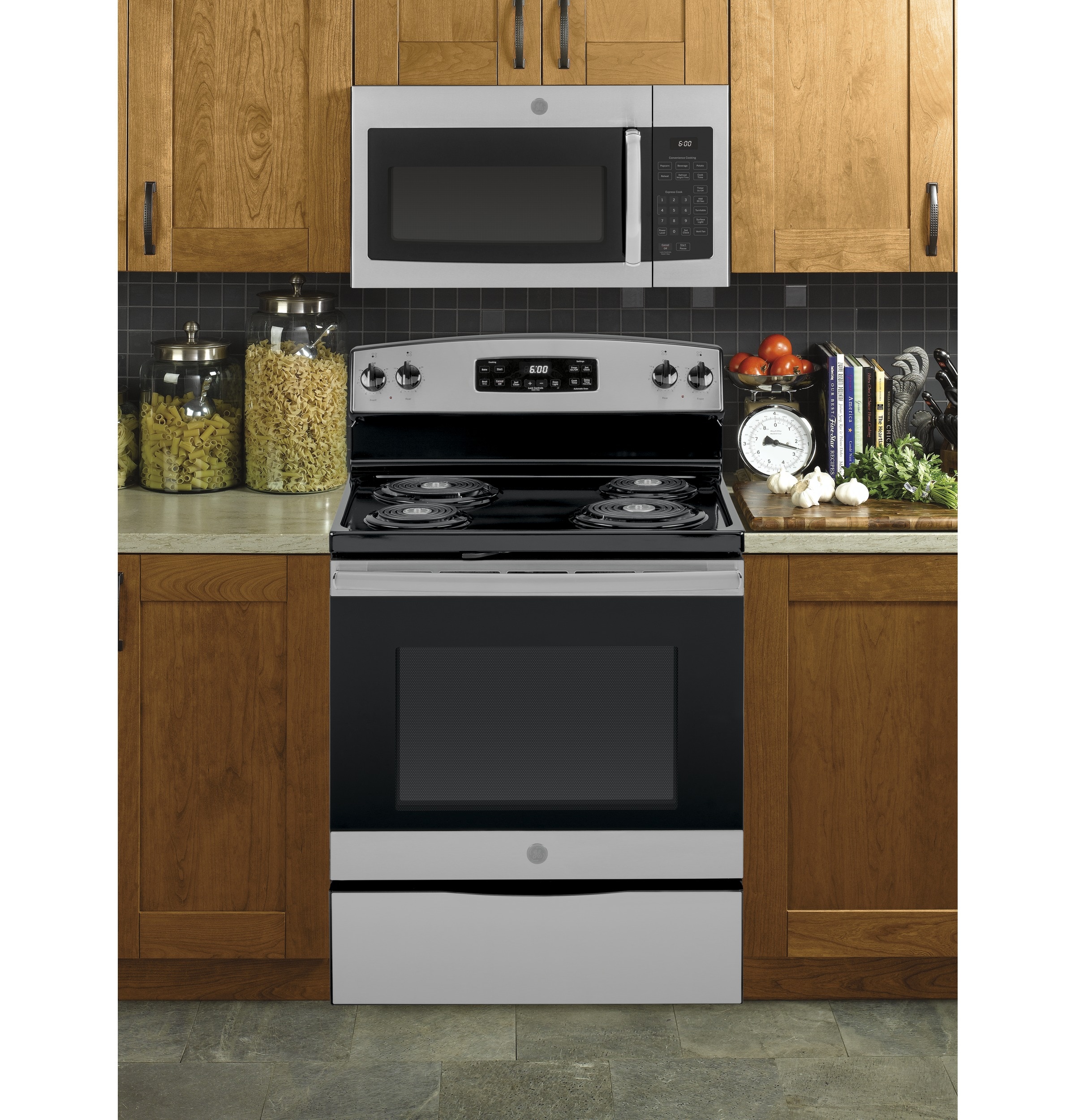 Horno de microondas sobre la estufa de 1.6 pies cúbicos y 29.9 pulgadas ( Acero inoxidable ) GE JVM3160RFSS