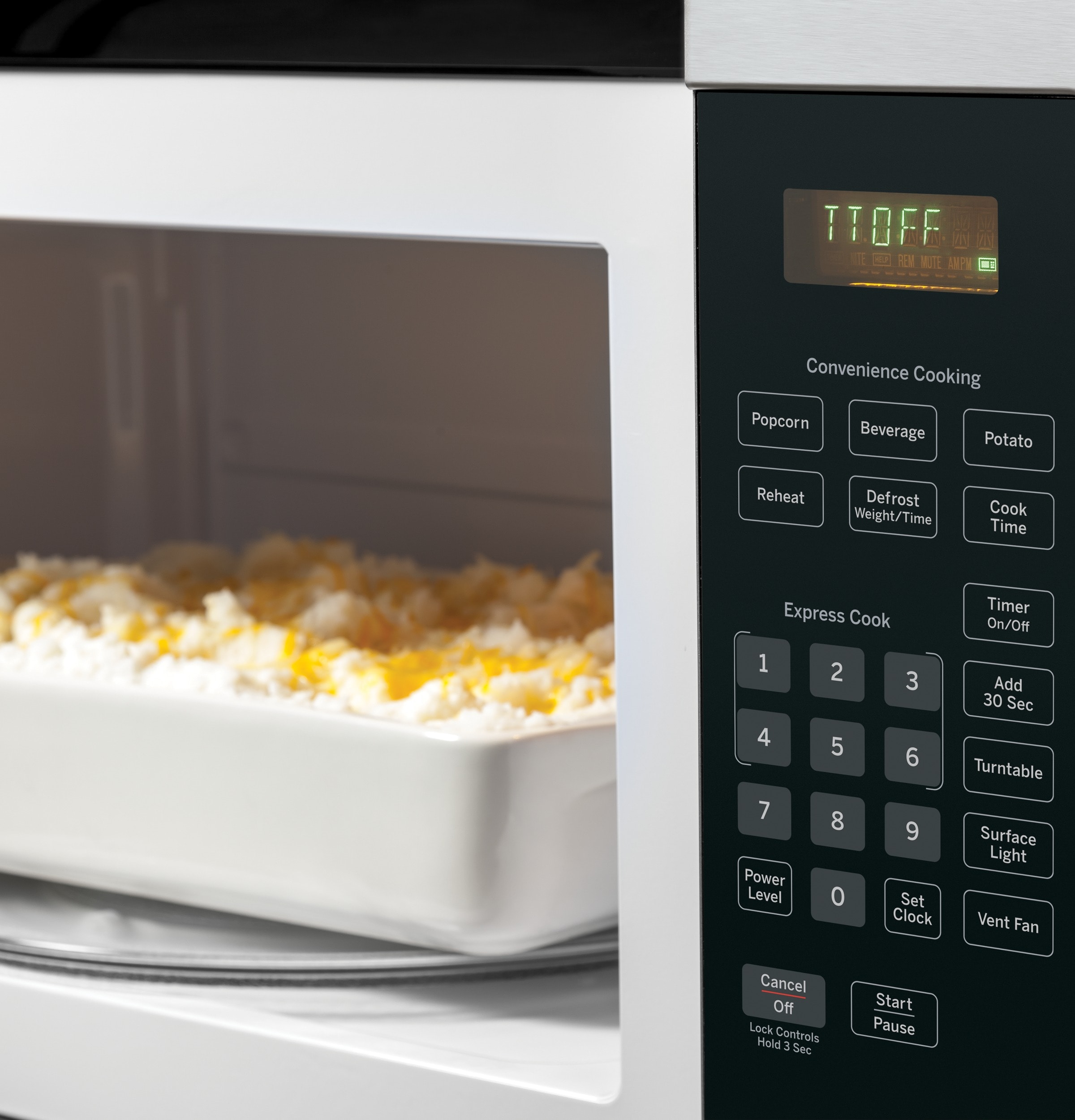 Horno de microondas sobre la estufa de 1.6 pies cúbicos y 29.9 pulgadas ( Acero inoxidable ) GE JVM3160RFSS
