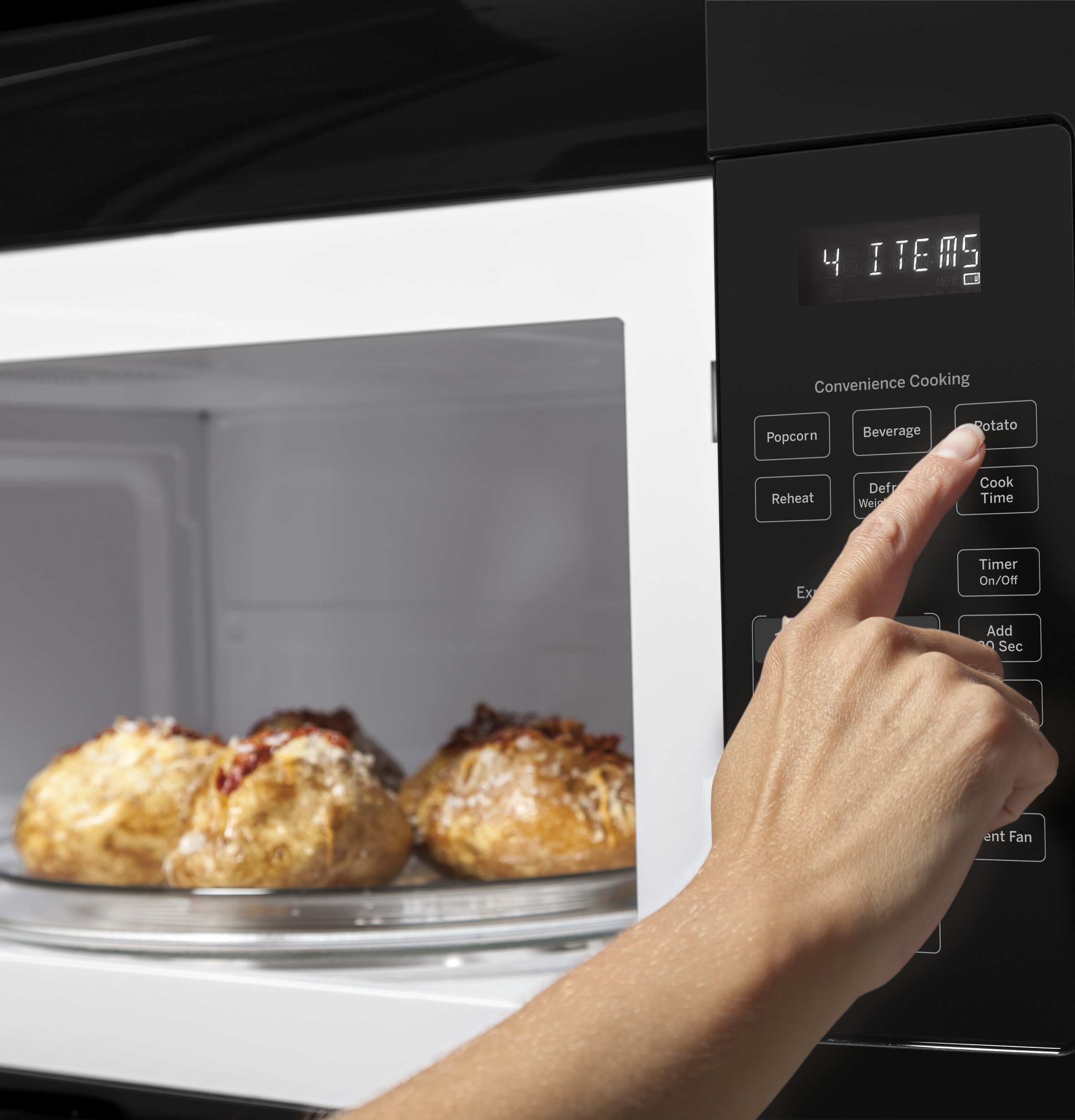 Microondas sobre la estufa de 1.6 pies cúbicos y 29.875 pulgadas (negro) JVM3160DFBB de GE