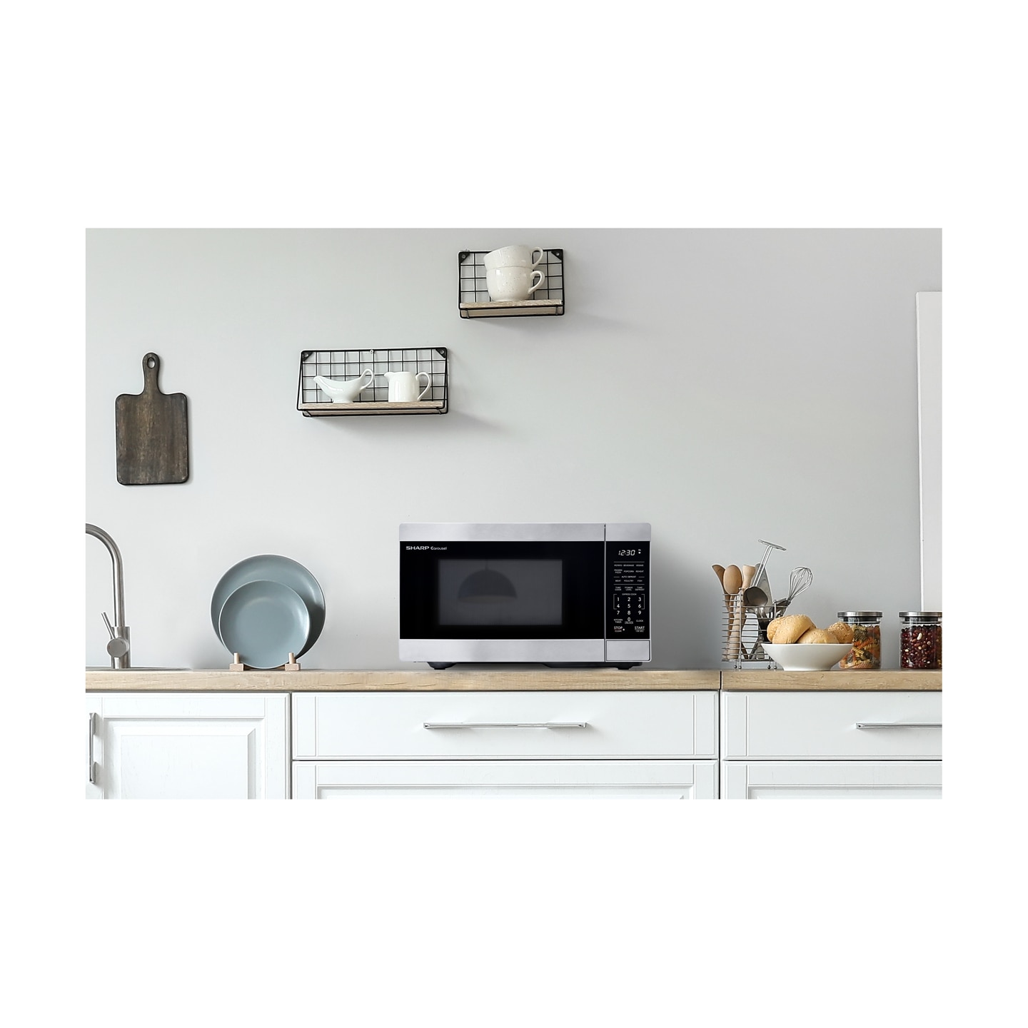 Microondas de Countertop de 0.9 pies cúbicos (menos de 1.5 pies cúbicos) y 900 Watts en Acero Inoxidable