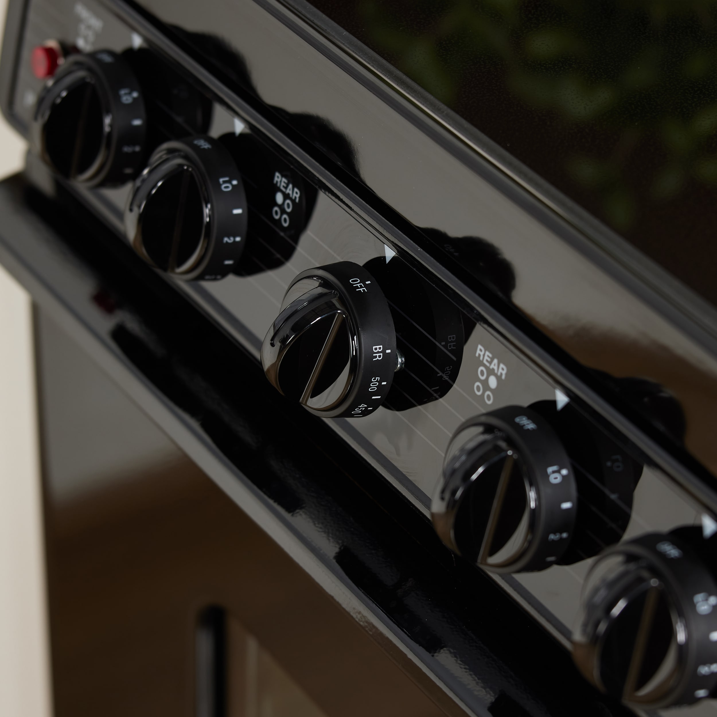 Estufa eléctrica independiente con 4 quemadores y tapa de vidrio de 20 pulgadas, 2.4 pies cúbicos - Negro sobre negro