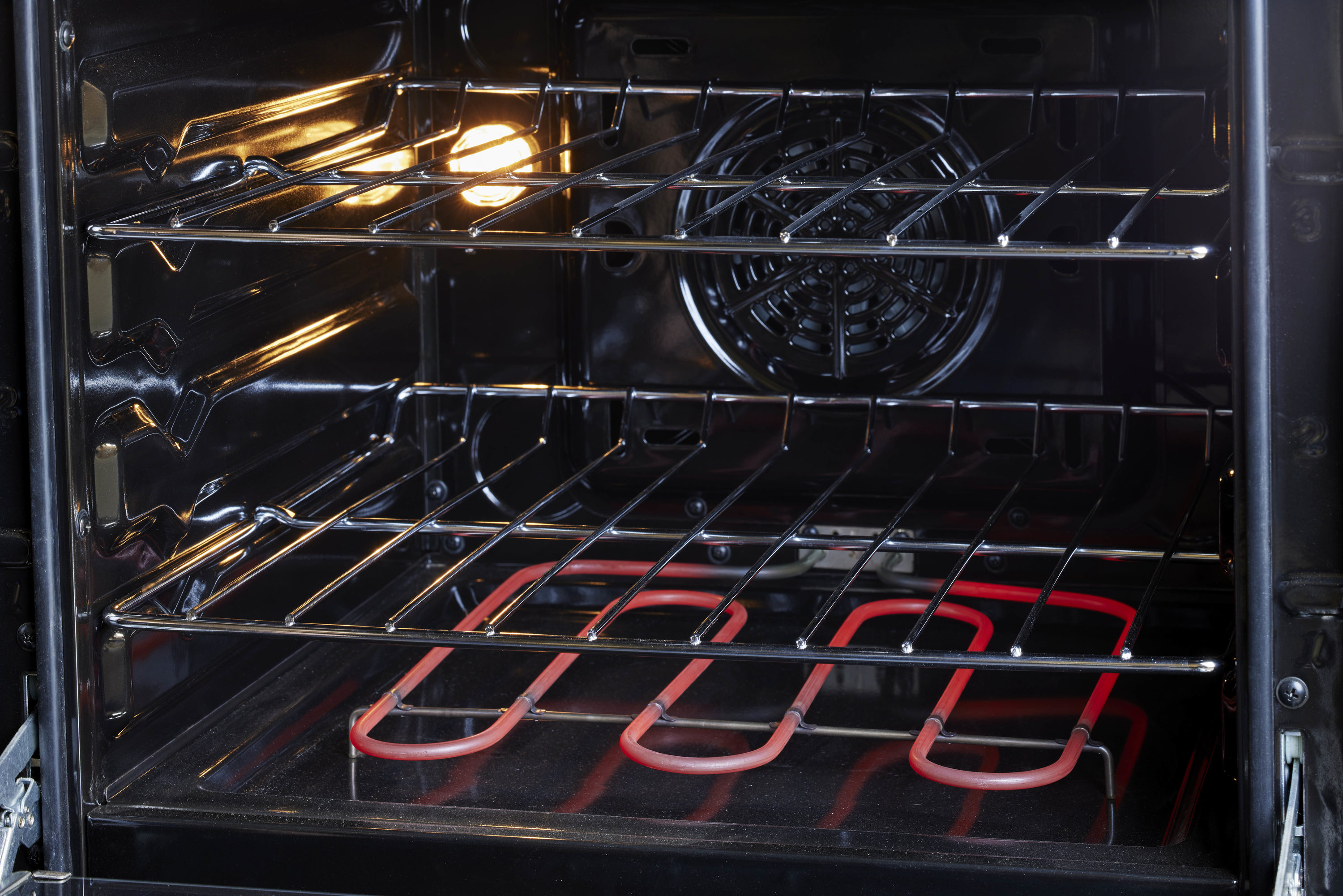 Estufa Eléctrica Independiente de 4 quemadores con horno de convección de 2.3 pies cúbicos y cubierta de vidrio de 24 pulgadas con recubrimiento WipeClean (Acero Inoxidable) de Prestige Único.