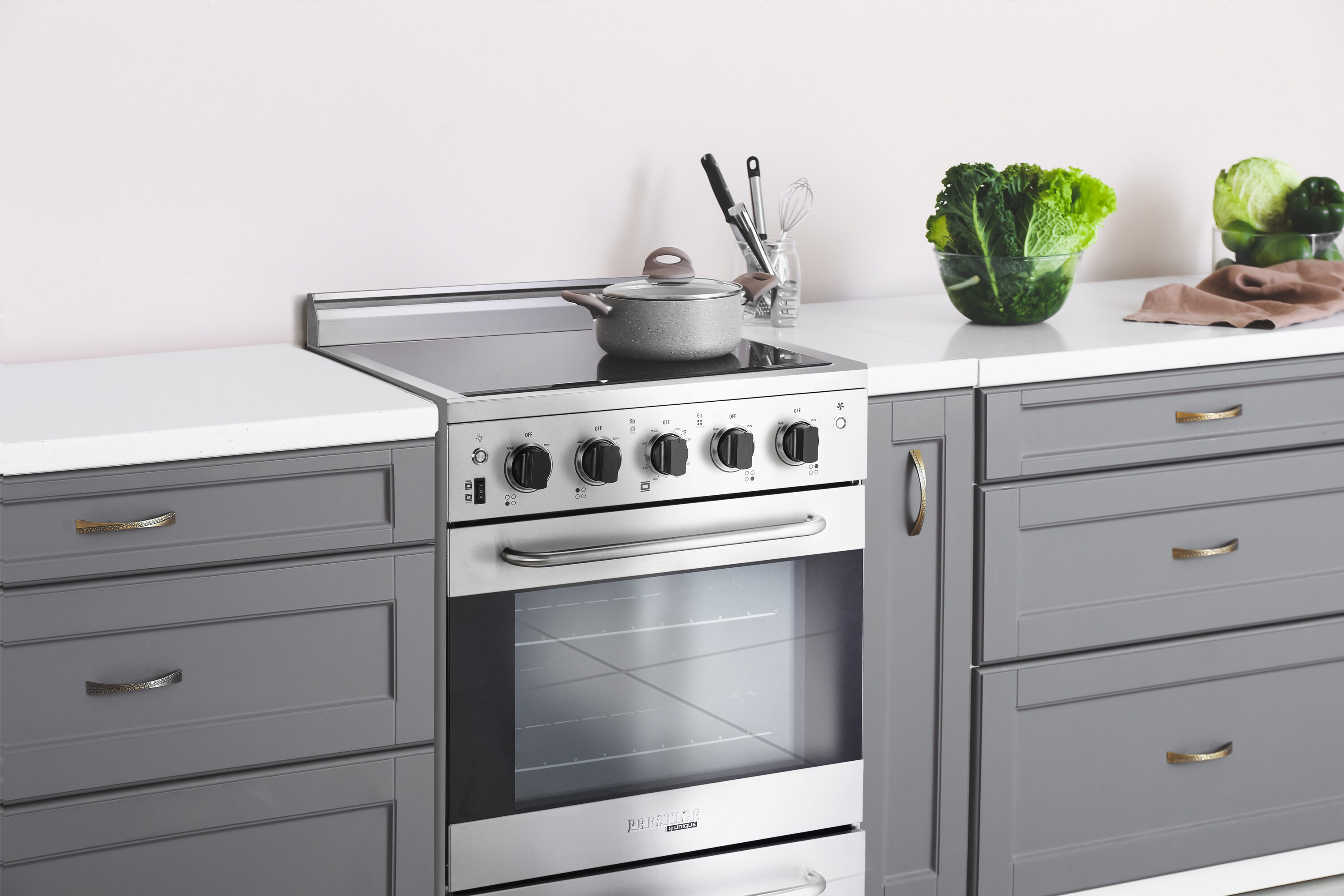 Estufa Eléctrica Independiente de 4 quemadores con horno de convección de 2.3 pies cúbicos y cubierta de vidrio de 24 pulgadas con recubrimiento WipeClean (Acero Inoxidable) de Prestige Único.