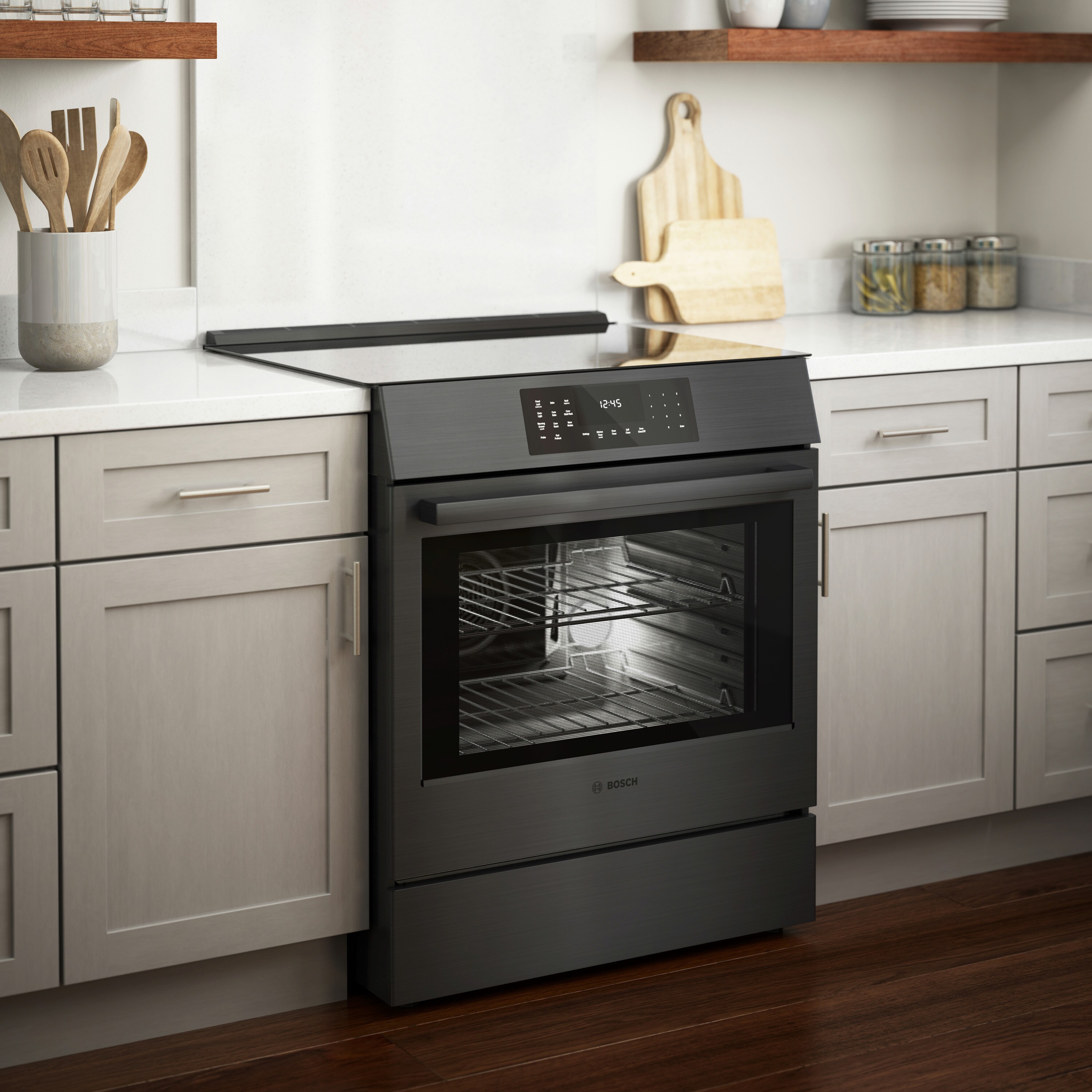 Estufa de inducción deslizante de un solo quemador con horno de convección de 4.6 pies cúbicos y 4 quemadores de la Serie 800 de Bosch (acero inoxidable negro) HII8047U