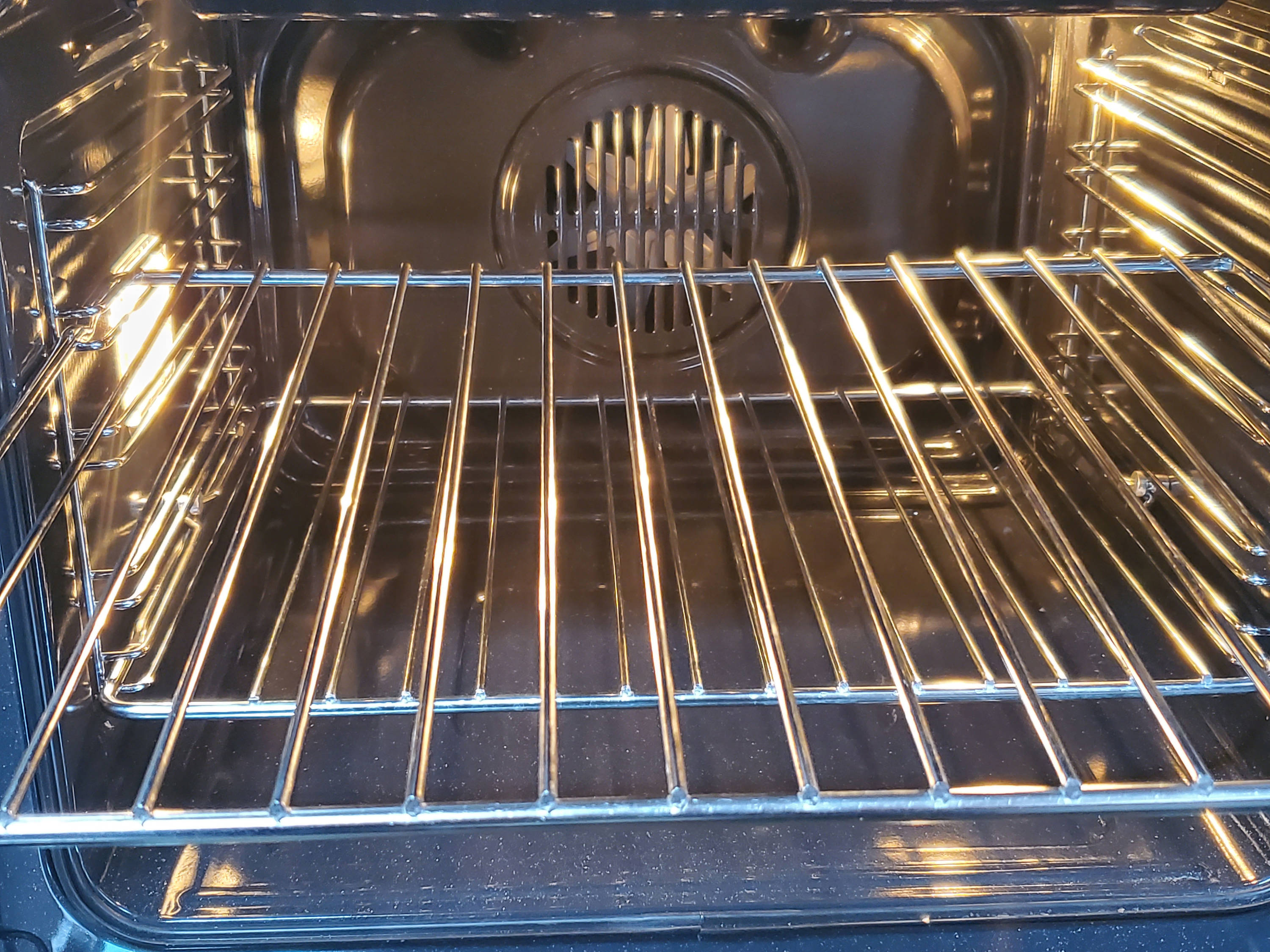 Estufa Eléctrica Independiente con Horno de Convección de 2.5 pies cúbicos, 4 quemadores y cubierta de vidrio de 24 pulgadas (acero inoxidable)