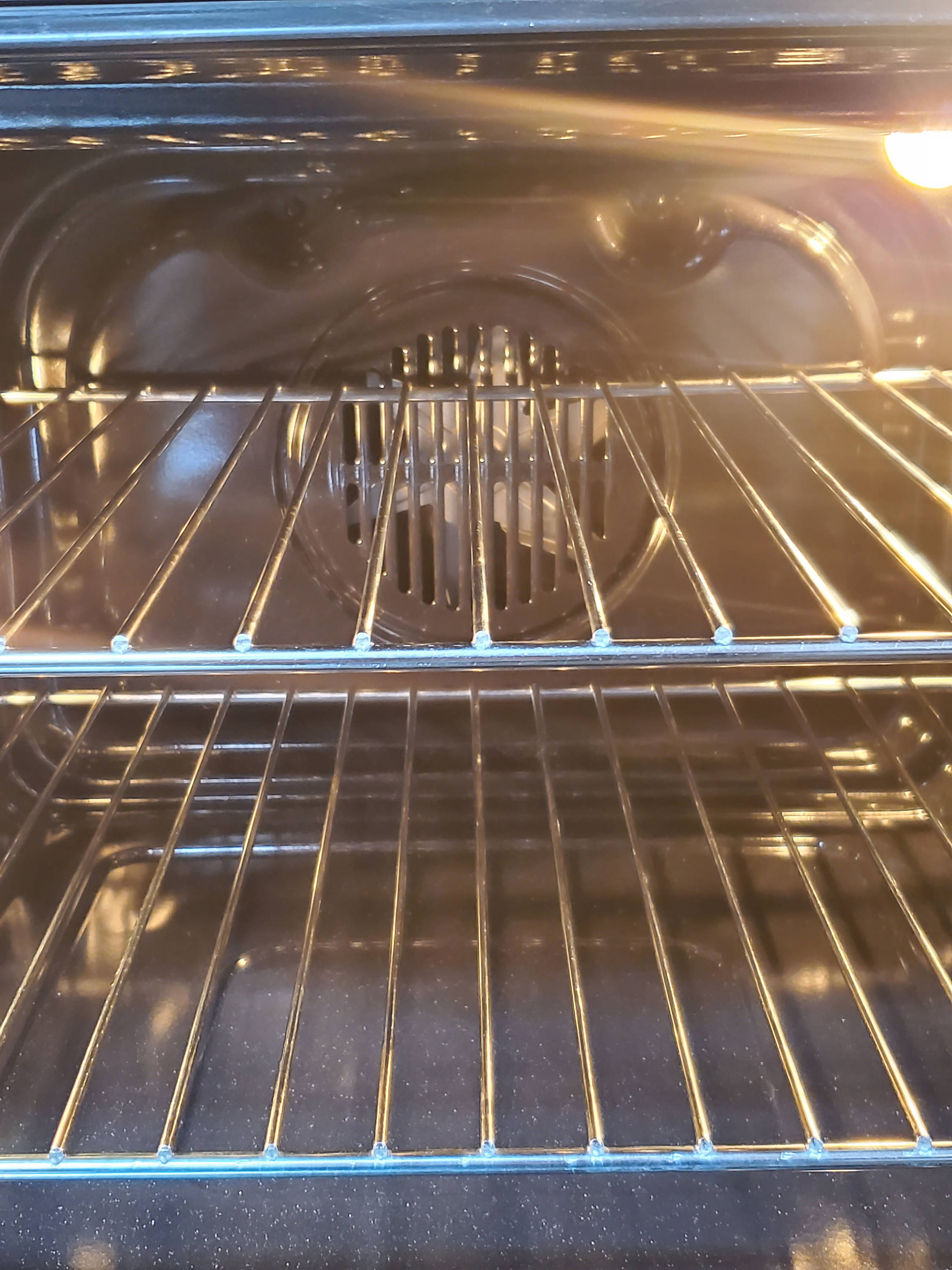 Estufa Eléctrica Independiente con Horno de Convección de 2.5 pies cúbicos, 4 quemadores y cubierta de vidrio de 24 pulgadas (acero inoxidable)