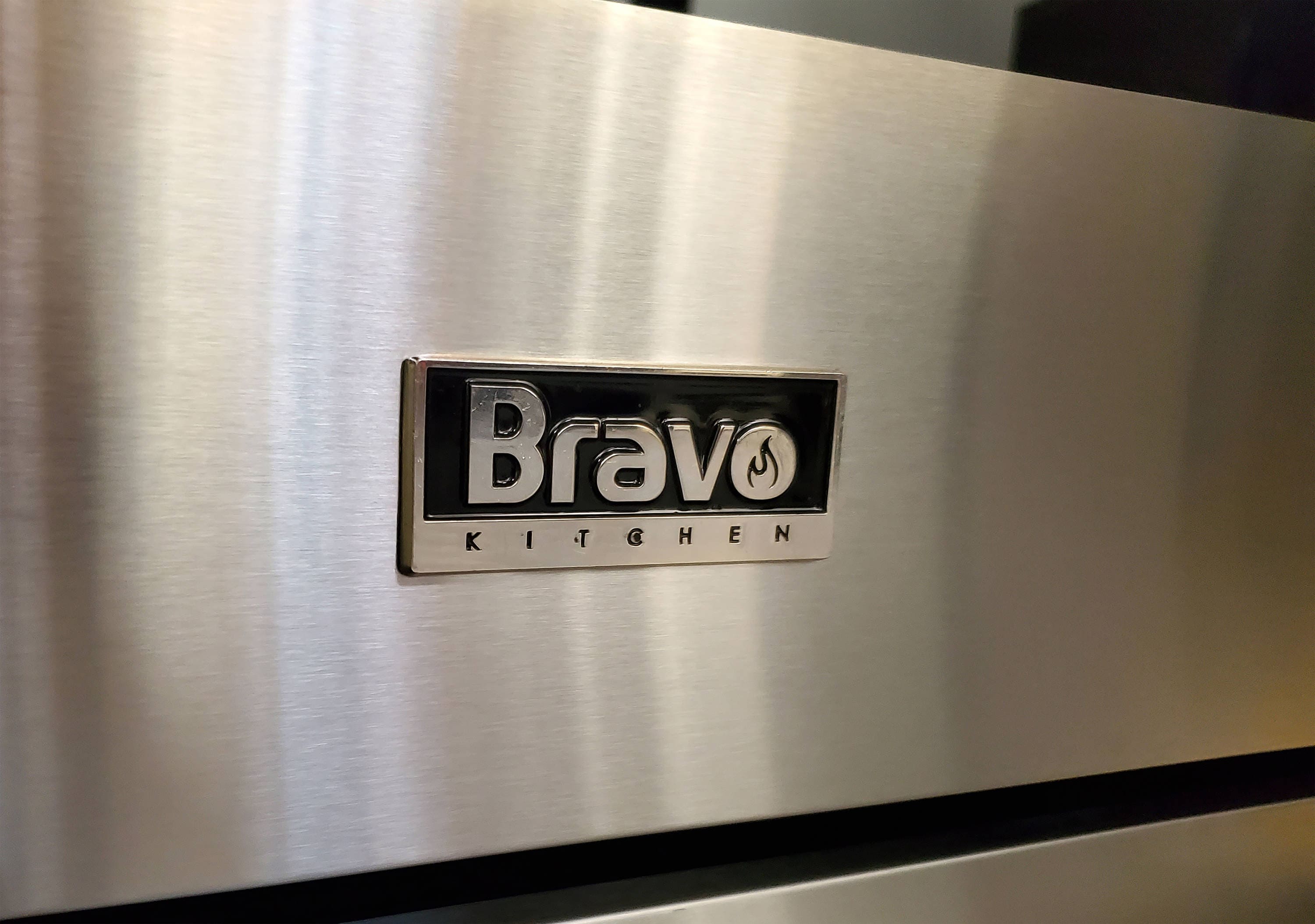 Estufa Eléctrica deslizable de 5 quemadores con horno de convección de 5 pies cúbicos y tapa de vidrio de 30 pulgadas en acero inoxidable Bravo Kitchen.