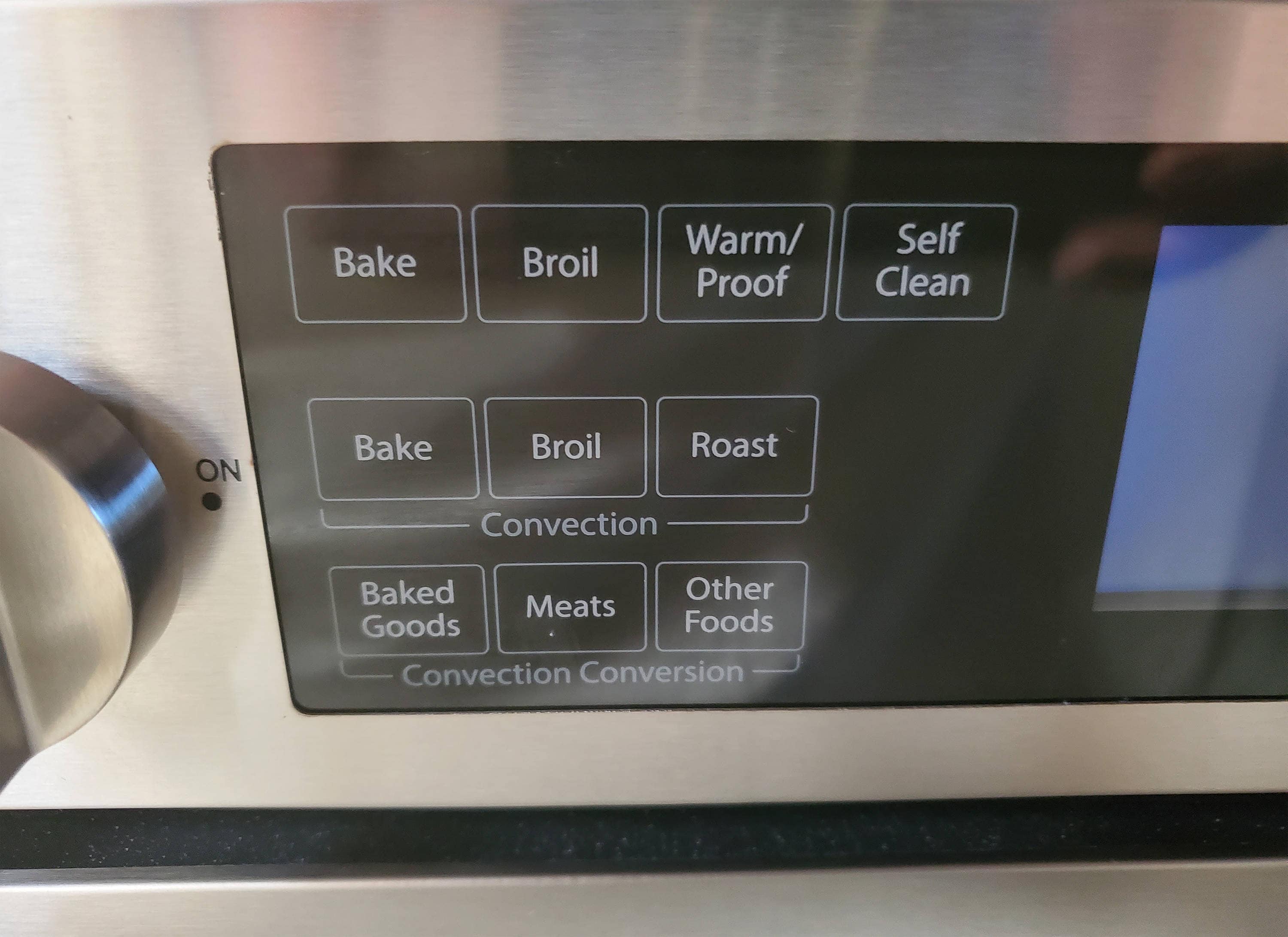Estufa Eléctrica deslizable de 5 quemadores con horno de convección de 5 pies cúbicos y tapa de vidrio de 30 pulgadas en acero inoxidable Bravo Kitchen.