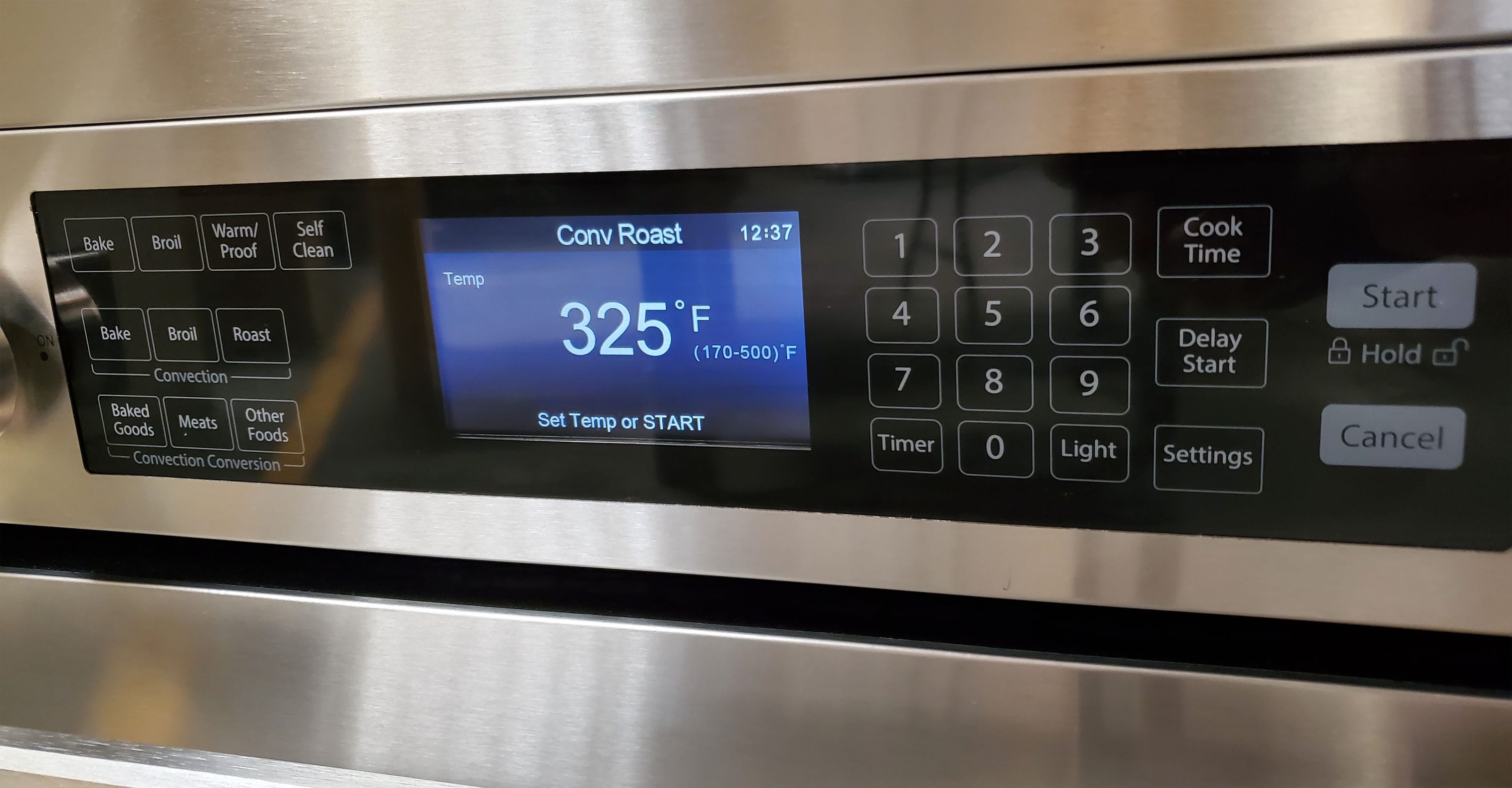 Estufa Eléctrica deslizable de 5 quemadores con horno de convección de 5 pies cúbicos y tapa de vidrio de 30 pulgadas en acero inoxidable Bravo Kitchen.