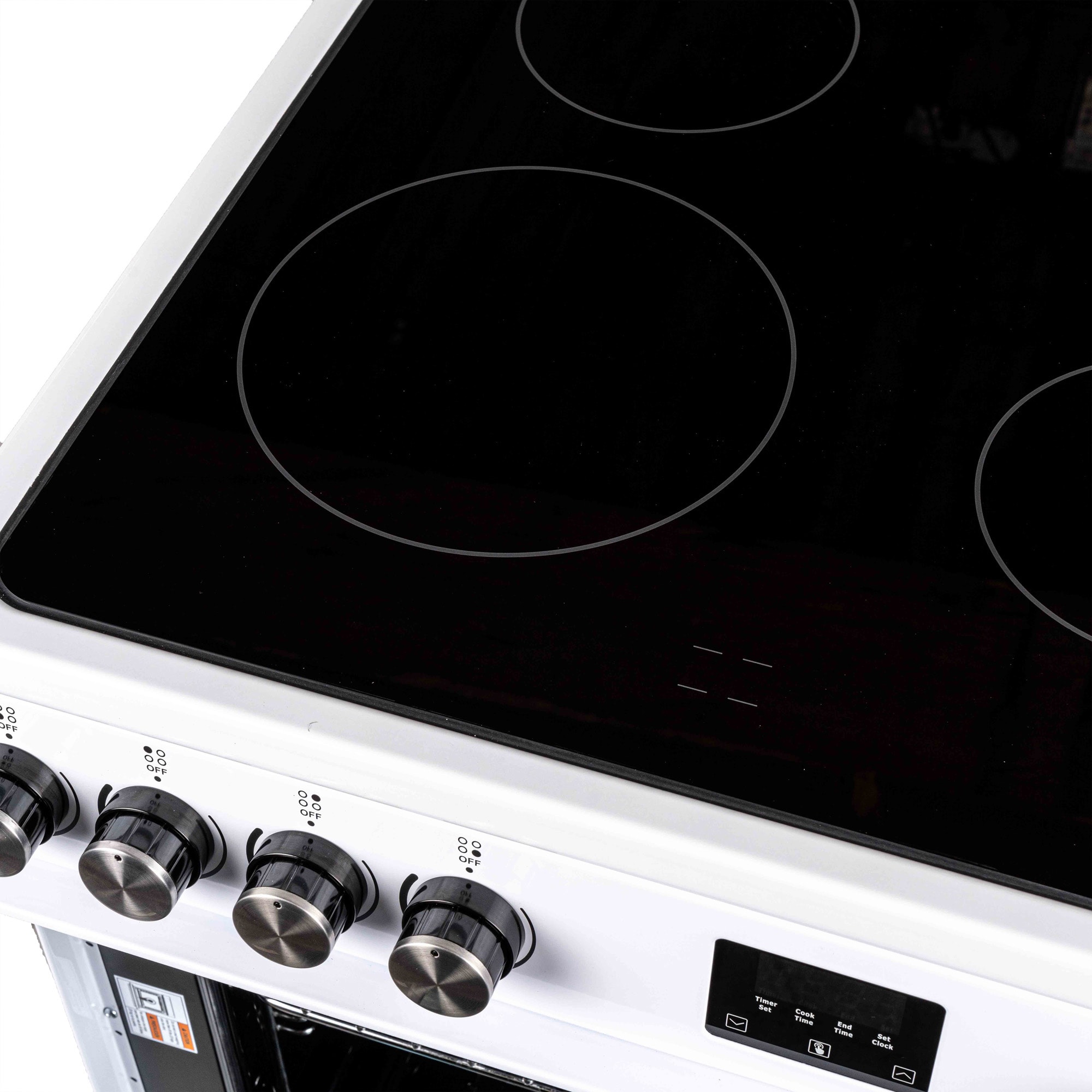 Estufa eléctrica independiente con horno de convección de 2.9 pies cúbicos y 4 quemadores de cristal de 24 pulgadas en color blanco.