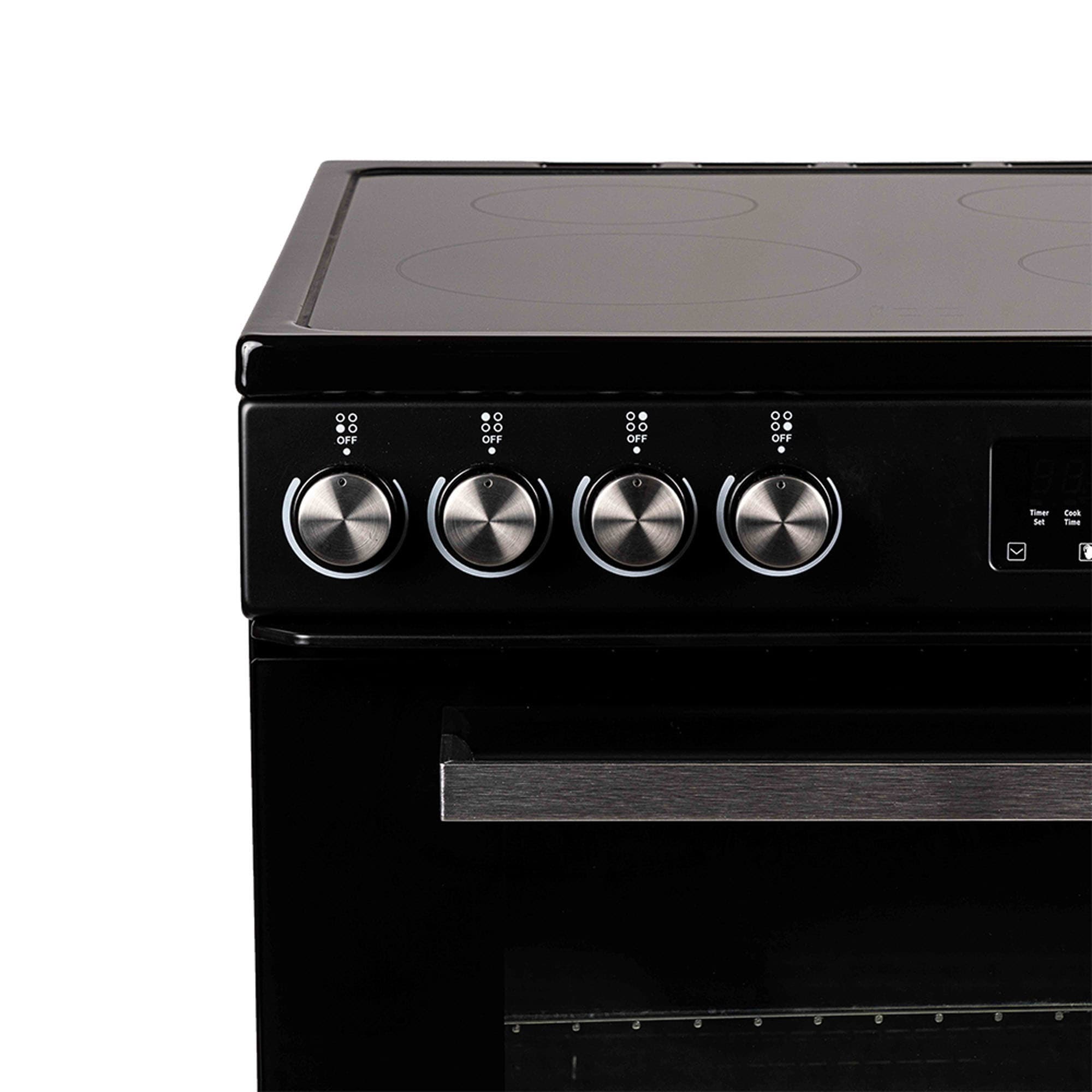 Estufa Eléctrica Independiente con Horno de Convección de 2.9 pies cúbicos y 4 quemadores en vidrio negro de 24 pulgadas Magic Chef
