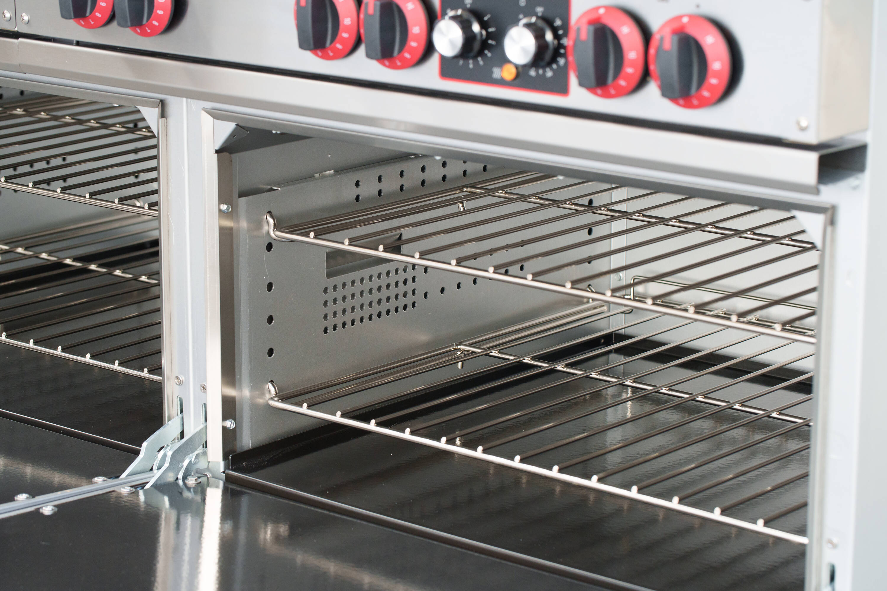 Estufa Eléctrica de Doble Horno de Pie con 10 Quemadores y Superficie de Bobina de 60 pulgadas y 5.55 pies cúbicos (Acero Inoxidable)